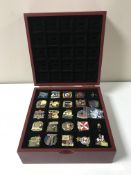 A cased set of British Victory enamel pin badges issued by the Danbury Mint.