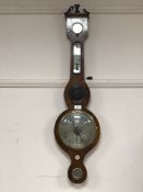 A Victorian inlaid banjo barometer with silvered dial