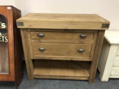 A reclaimed pine two drawer butcher's block