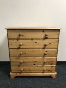 A pine five drawer chest