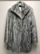 A grey mink fur coat