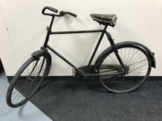 A vintage gents bicycle with a leather saddle