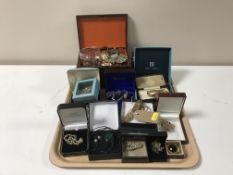 A tray of assorted costume jewellery and wrist watches