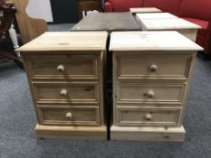 A near pair of pine three drawer bedside chest (2)