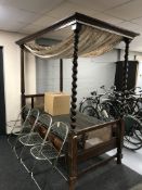 A Victorian barley twist column 3' four poster bed with box spring and curtains