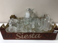 Two boxes containing a large quantity of glassware, collector's plates, sherry barrel,