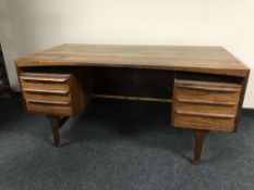 A mid 20th century rosewood twin pedestal desk CONDITION REPORT: Watermarks to top.