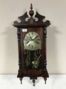 A Polaris 31 day wall clock and a plastic deer's head