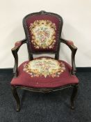 A carved walnut framed armchair