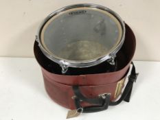 A Premier snare drum case containing a Roberts drum and two extra skins
