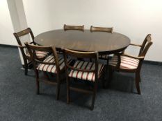An inlaid mahogany drop leaf table and six chairs