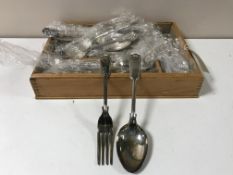 A wooden cutlery tray containing a quantity of Sheffield plate cutlery