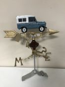 A cast iron Land Rover weather vane and mount
