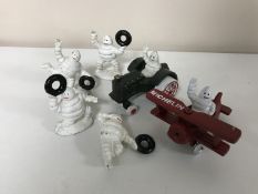 Six cast iron figures - Michelin plane,