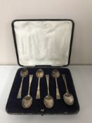 A set of six cased silver teaspoons
