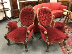 A fine pair of Victorian carved walnut spoonback chairs