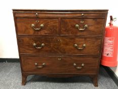 A Georgian mahogany gentleman's chest with brushing slide