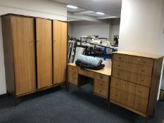 A teak three piece bedroom suite