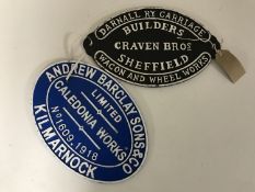 Two cast iron coach builder signs