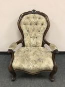 A Victorian walnut armchair