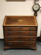 A Victorian inlaid mahogany bureau