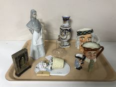 A tray of collectables including Chinese soapstone seal, Chinese carved deity, Spanish figure,