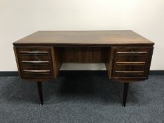 A mid 20th century Danish rosewood twin pedestal desk fitted six drawers CONDITION