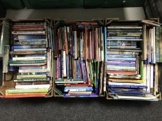 Three boxes of books relating to history,