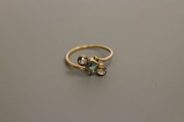 An 18ct gold three stone dress ring, 2.