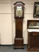 A Victorian inlaid mahogany grandmother clock with silvered dial