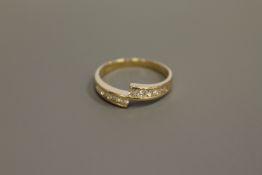 An 18ct gold 10 stone diamond ring,