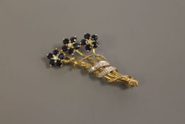 A 9ct gold floral brooch, 4.