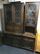 A Chapmans Siesta oak linen fold twin section cocktail display unit