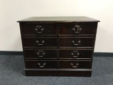 A mahogany four drawer filing chest inset green leather panel top