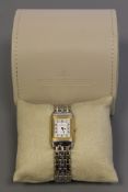A lady's steel and gold Jaeger LeCoultre wristwatch, model: Reverso, Ref: 260.5.