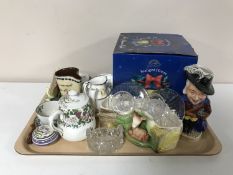 A tray of boxed Ringtons tea light house, character jug, glass ware, Devon ware vase,