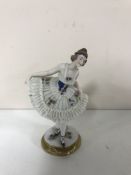 An early 20th century fine china Chelsea style figure - dancing lady