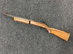 A Benjamin model 347 air rifle in American walnut finish