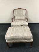 A Chapmans Siesta Victorian style armchair and stool upholstered in a pink and cream fabric