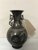 A 19th century Chinese silver twin handled vase, height 15.