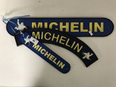 Three cast iron plaques - Michelin signs