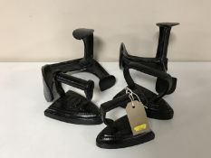 Two cobbler's lasts and three flat irons