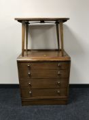 A mid 20th century four drawer chest and a folding walnut table