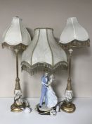 A china figure table lamp from the Elegant Collection and a pair of contemporary gilt table lamps
