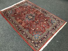 A fringed Persian Kashan rug,