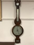 An early Victorian inlaid mahogany barometer