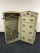 An early 20th century large vellum travelling wardrobe