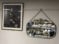 A brass framed Art Nouveau mirror and a gilt framed print HRH Philip The Duke of Edinburgh by