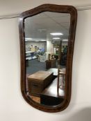 An inlaid mahogany wall mirror