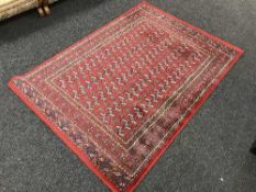 A contemporary floral patterned rug and one other